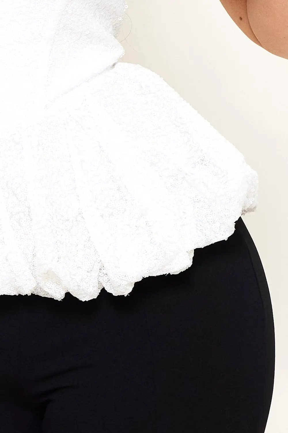 Sequin Peplum Jumpsuit – Bell Bottom With Criss Cross Back Tie Detail BOUTINIE