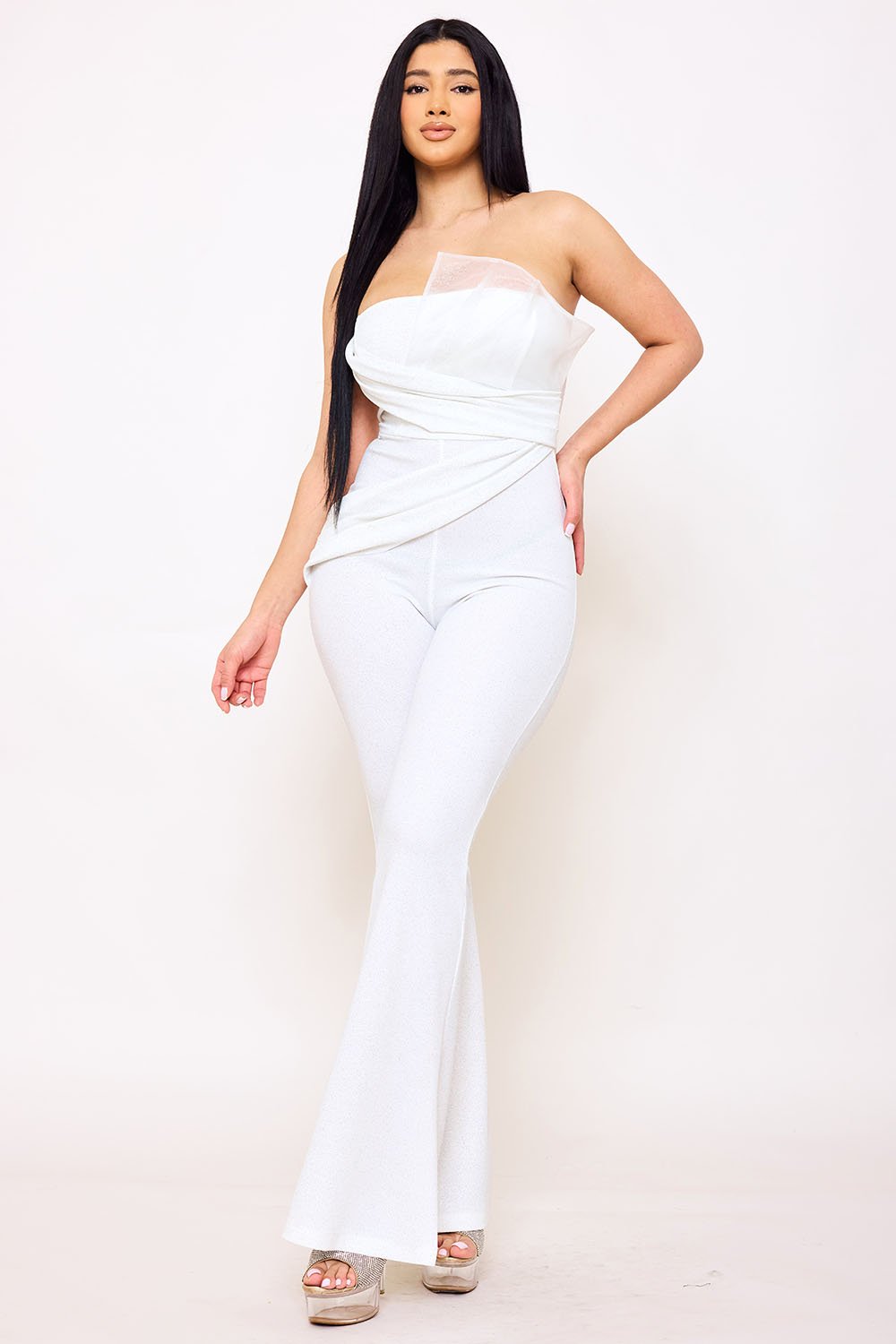 White strapless jumpsuit with gathered corset-style bodice and flared legs for a chic evening look from Boutinie.