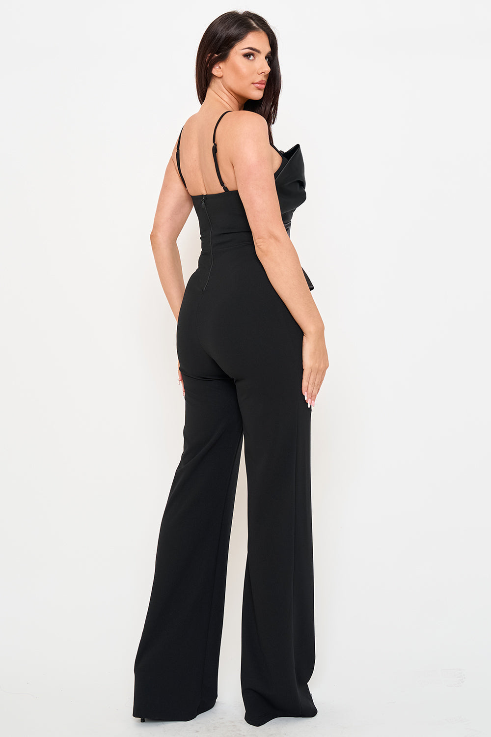 Elegant black wide-leg jumpsuit with a corset-style bodice and spaghetti straps, perfect for formal evening wear.