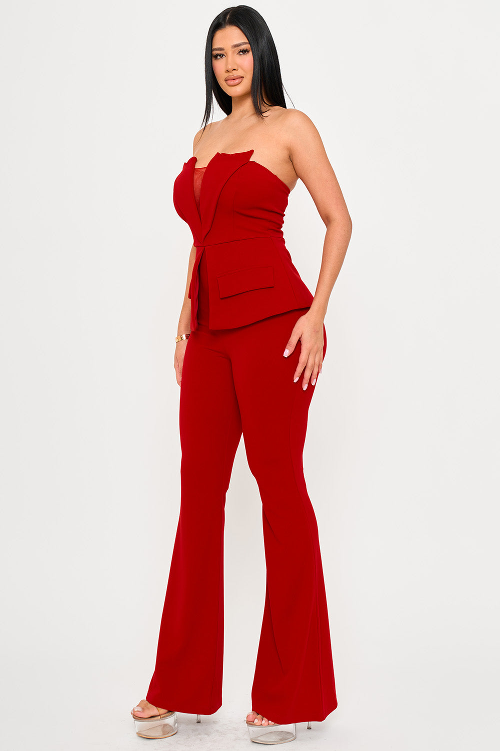 Red strapless peplum jumpsuit with blazer-style bodice and flared legs from Boutinie for an evening look.
