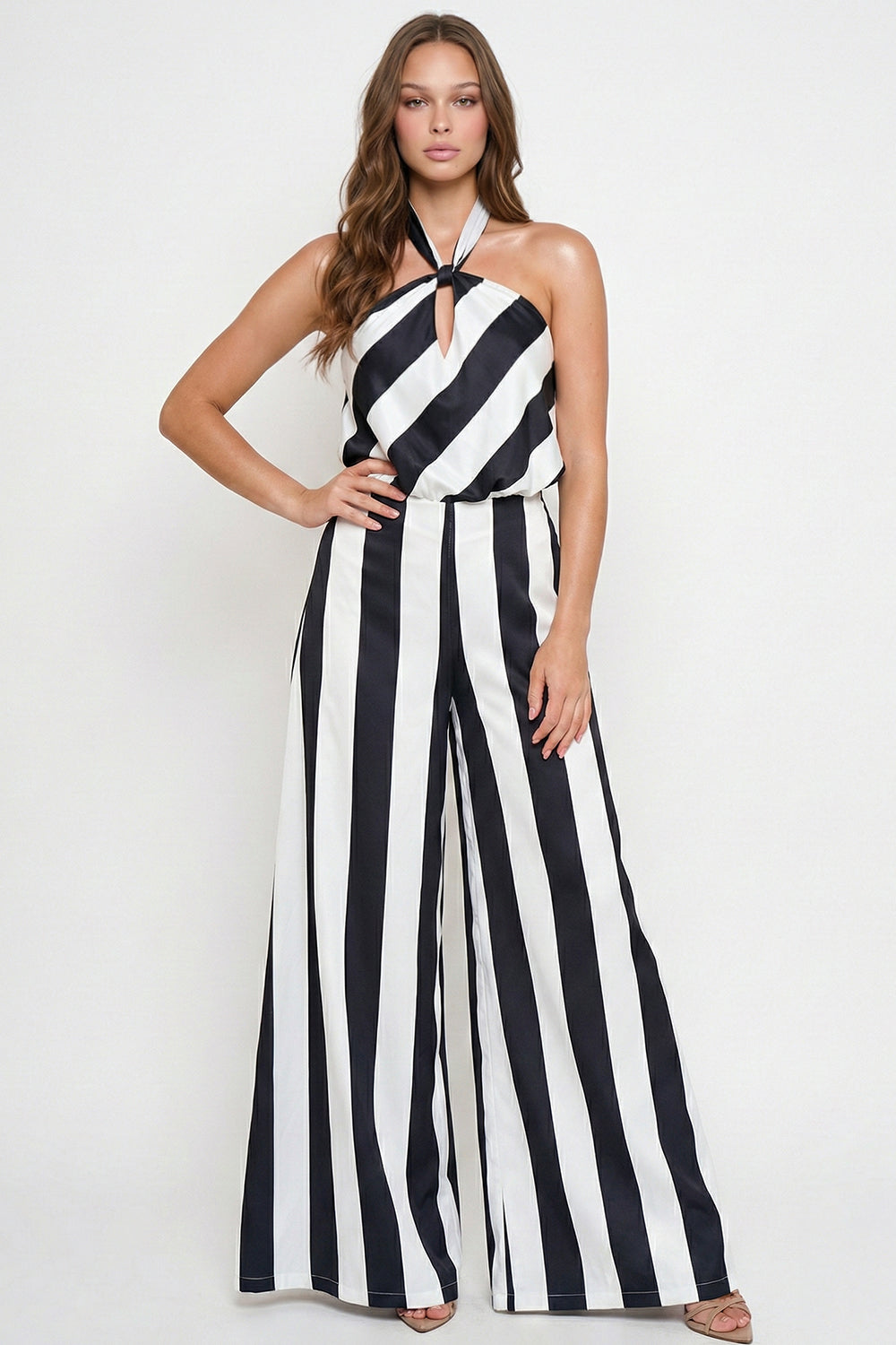 Boutinie black and white striped halter-neck wide-leg jumpsuit for a chic evening look.