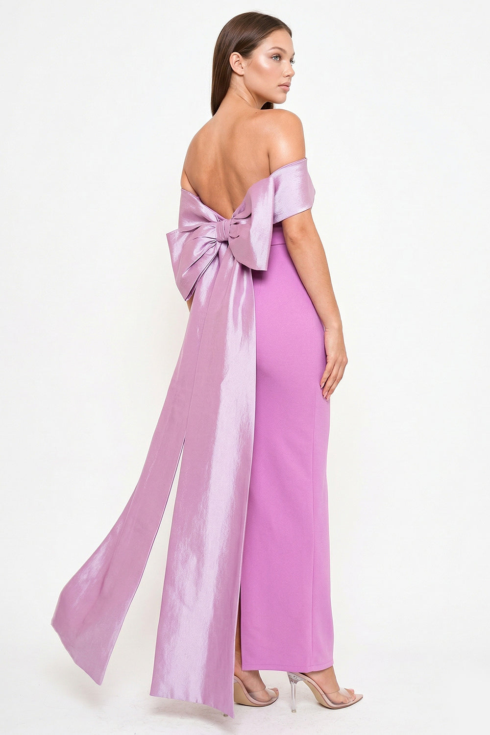 Mauve off-the-shoulder evening gown with a large statement bow and floor-length train from Boutinie.
