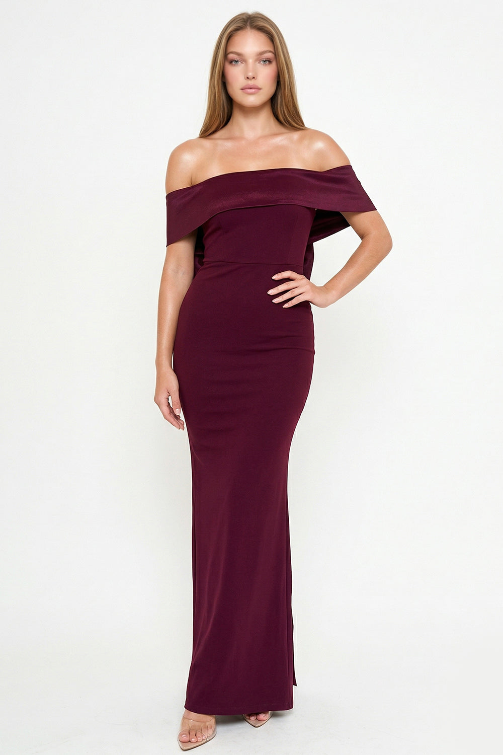 Burgundy off-the-shoulder evening gown with a fitted silhouette, perfect for formal events from Boutinie.