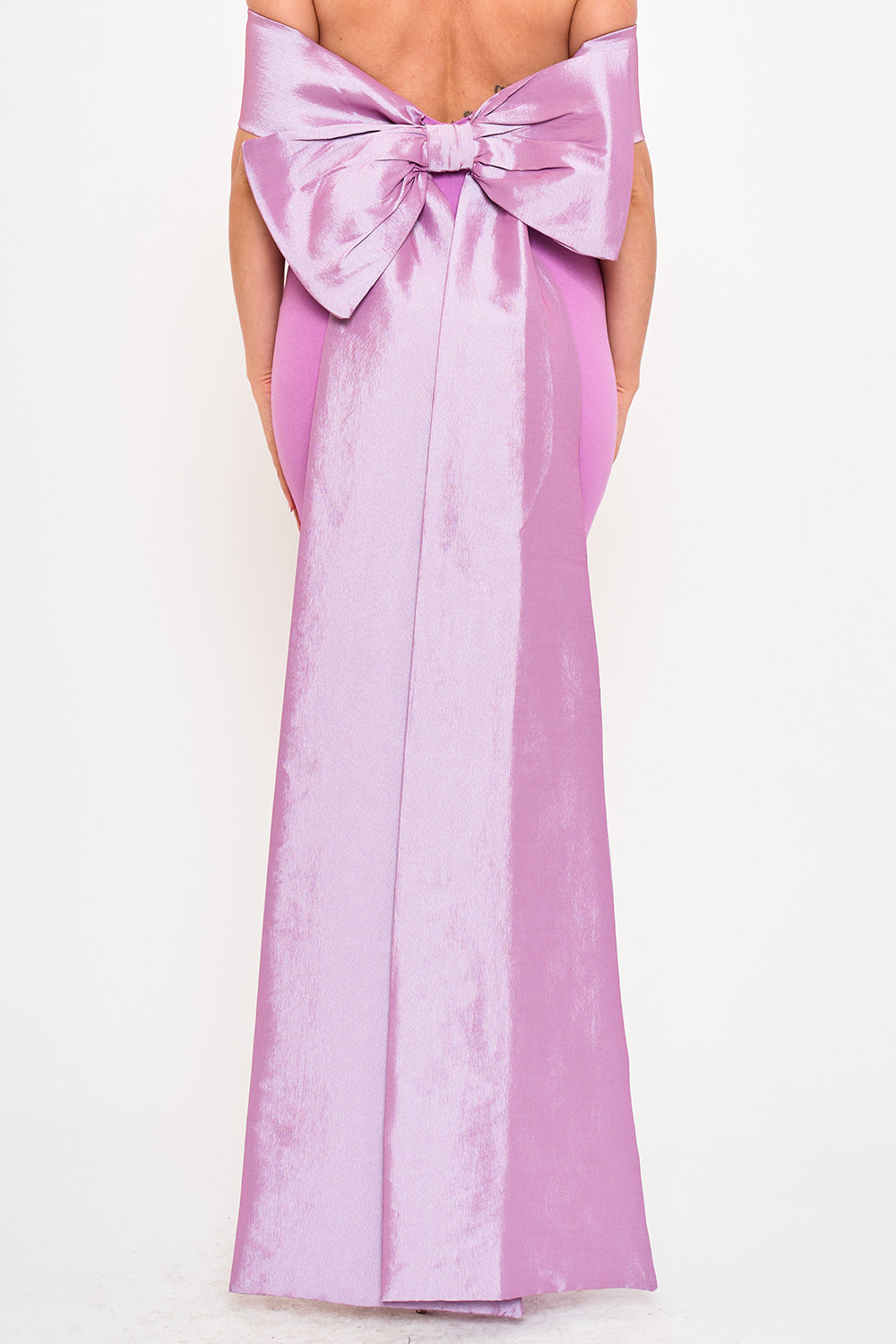 Mauve off-shoulder maxi gown with a large statement bow back, perfect for formal events from Boutinie.