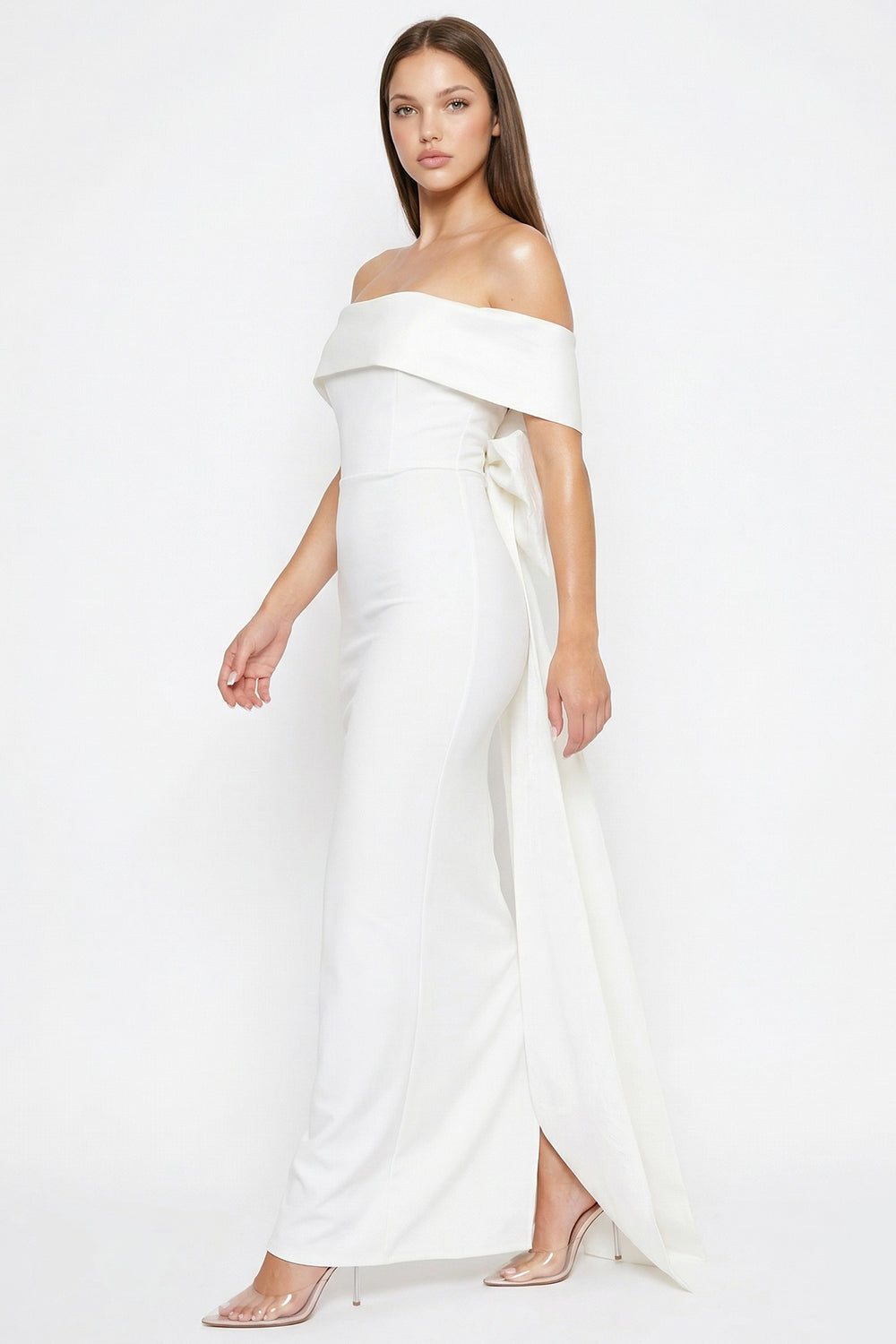 White off-the-shoulder evening gown with a structured bodice and elegant train by Boutinie.