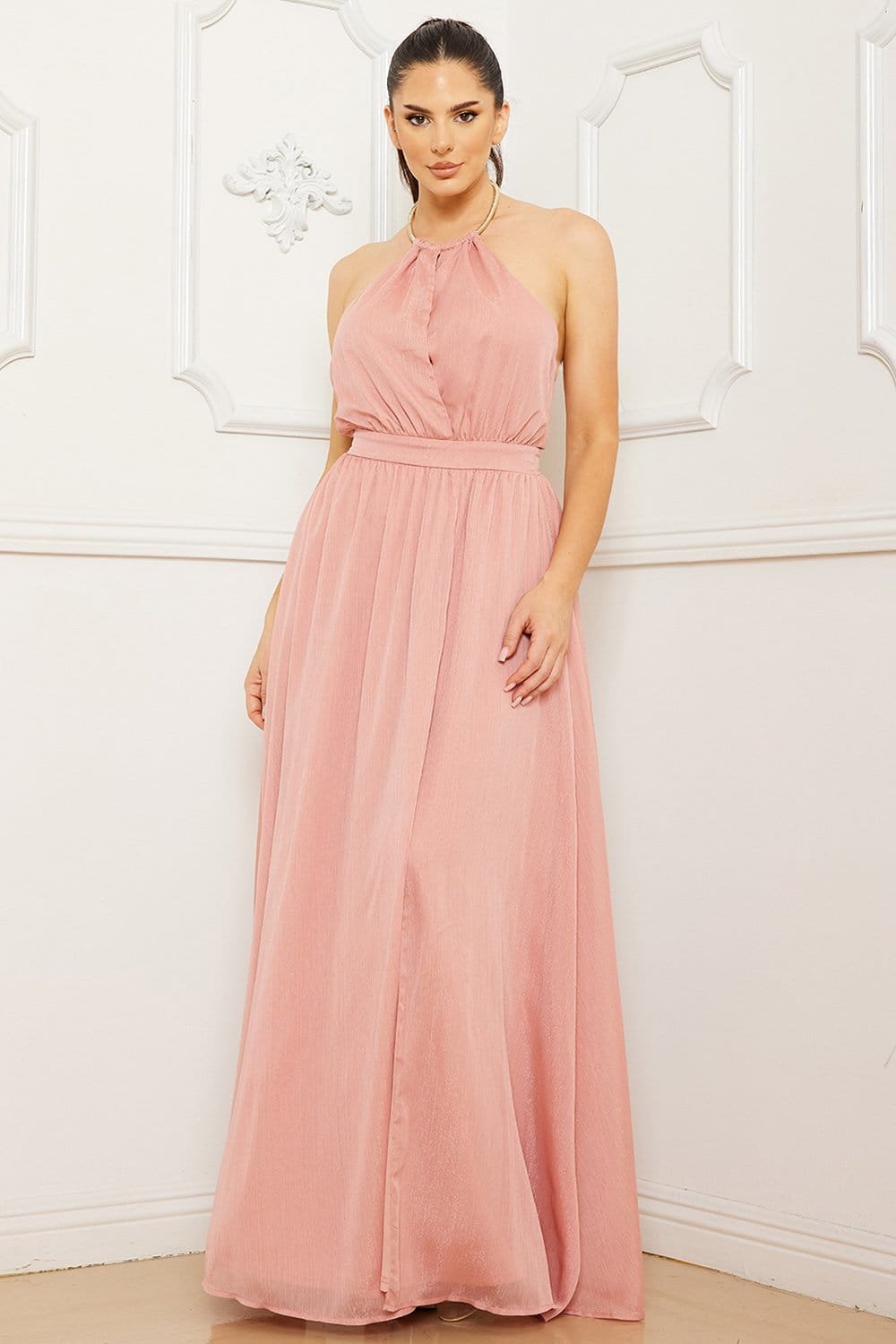 Dusty pink sleeveless halter maxi dress with a fitted waist and flowing chiffon fabric, perfect for formal occasions.