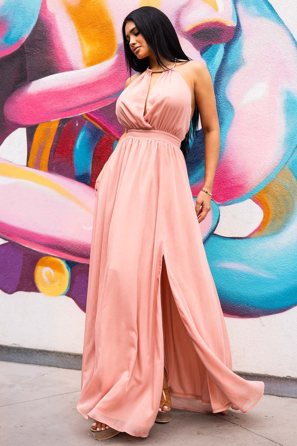 Sage green chiffon maxi dress with a halter neckline, keyhole cutout, and high leg slit for formal occasions.
