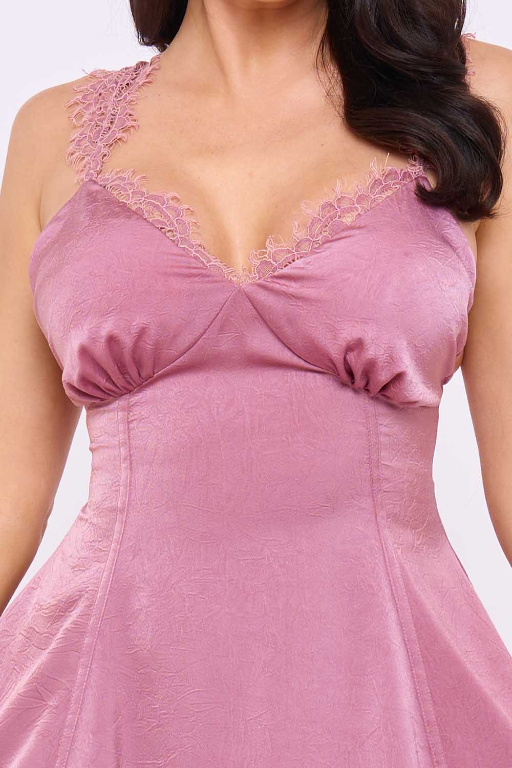 Dusty rose camisole top in textured satin with delicate lace trim, V-neckline, and feminine corset-style bodice.