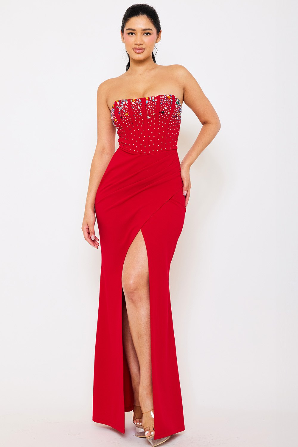 Boutinie red strapless evening gown with embellished bodice and front slit for formal occasions.