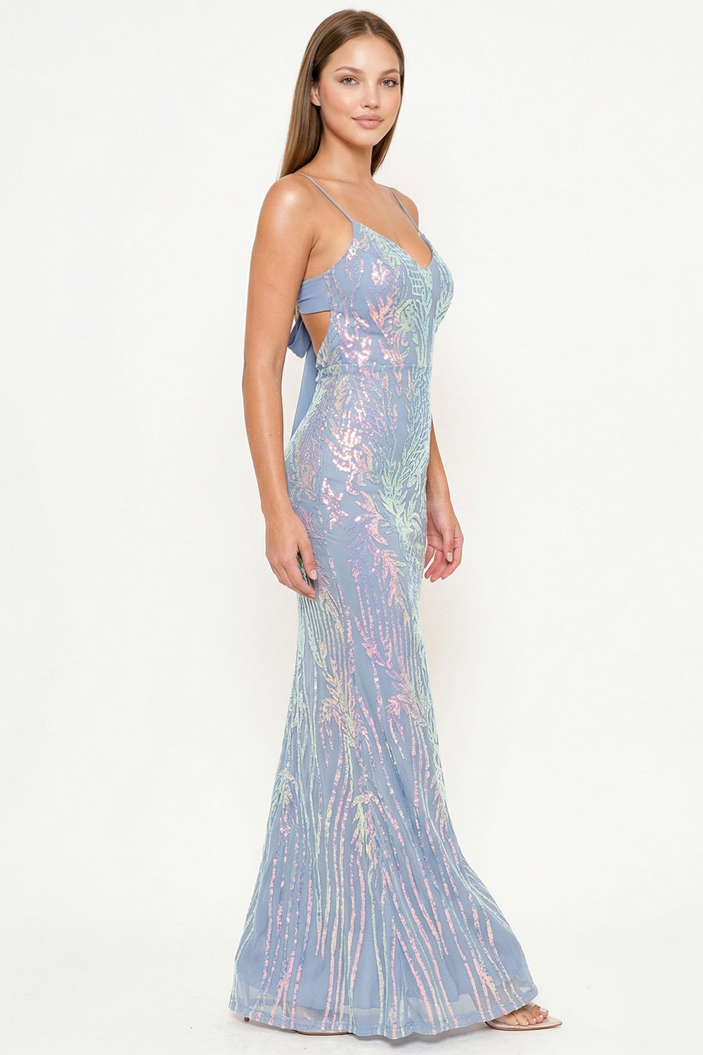 Blue iridescent sequin maxi dress with a V-neck, spaghetti straps, and open back for formal events by Boutinie.