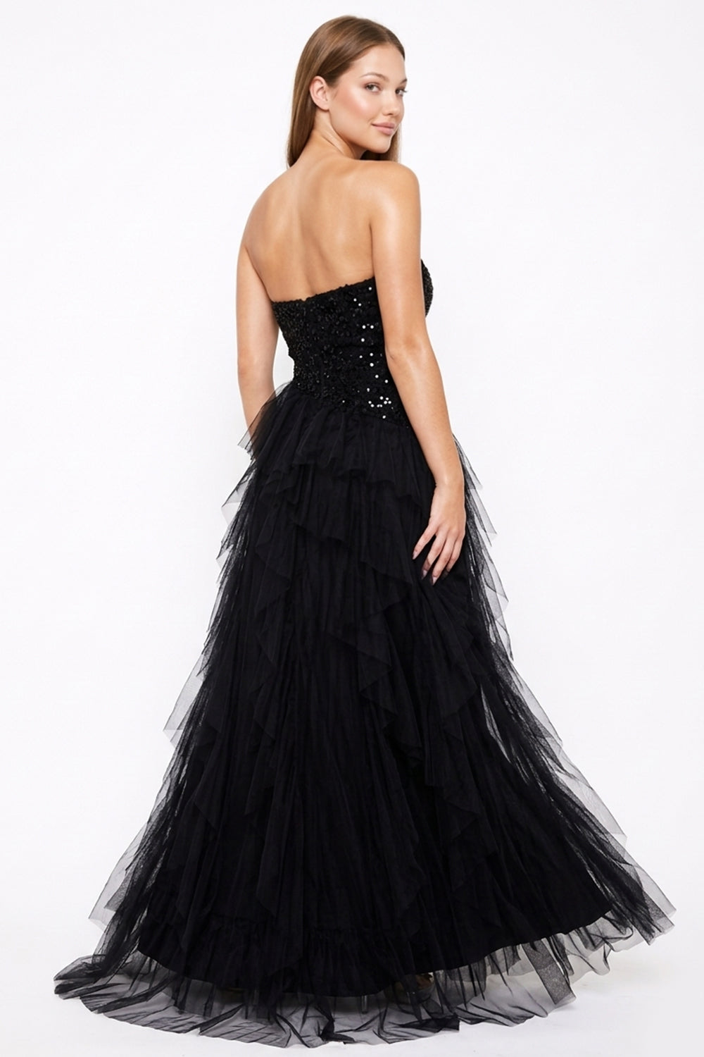 Strapless black sequin gown with a layered tulle skirt, perfect for formal evening occasions.