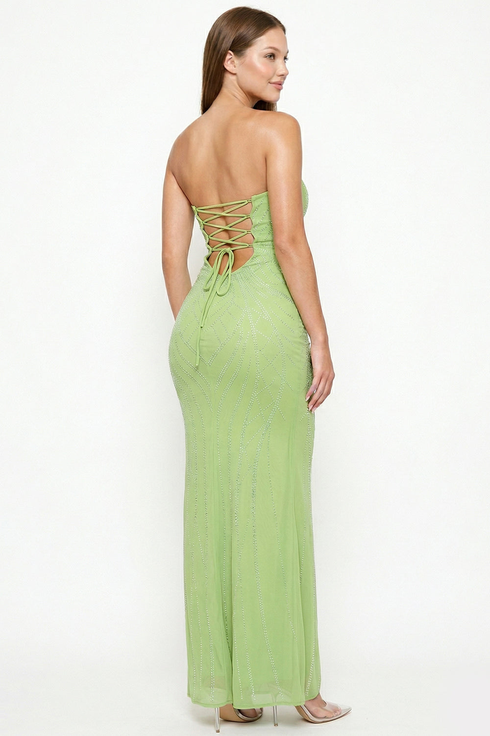 Lime green strapless formal gown with crystal embellishments and a lace-up corset back from Boutinie.