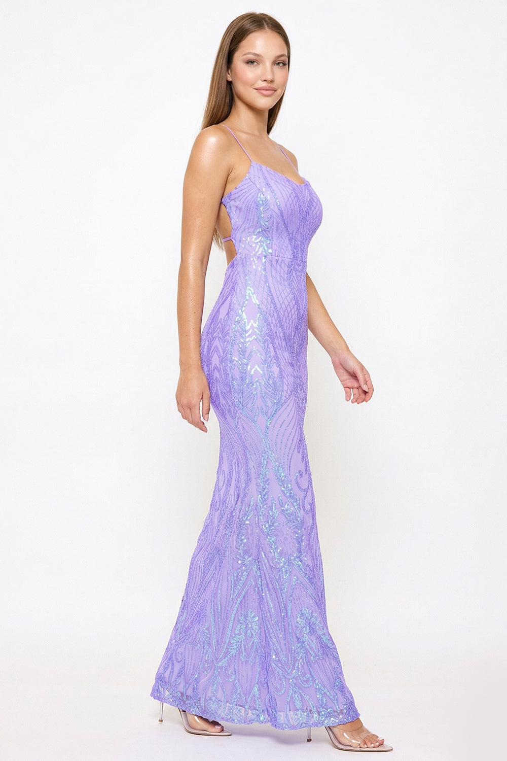 Lavender sequin mermaid gown with spaghetti straps and open back, perfect for formal evening events by Boutinie.
