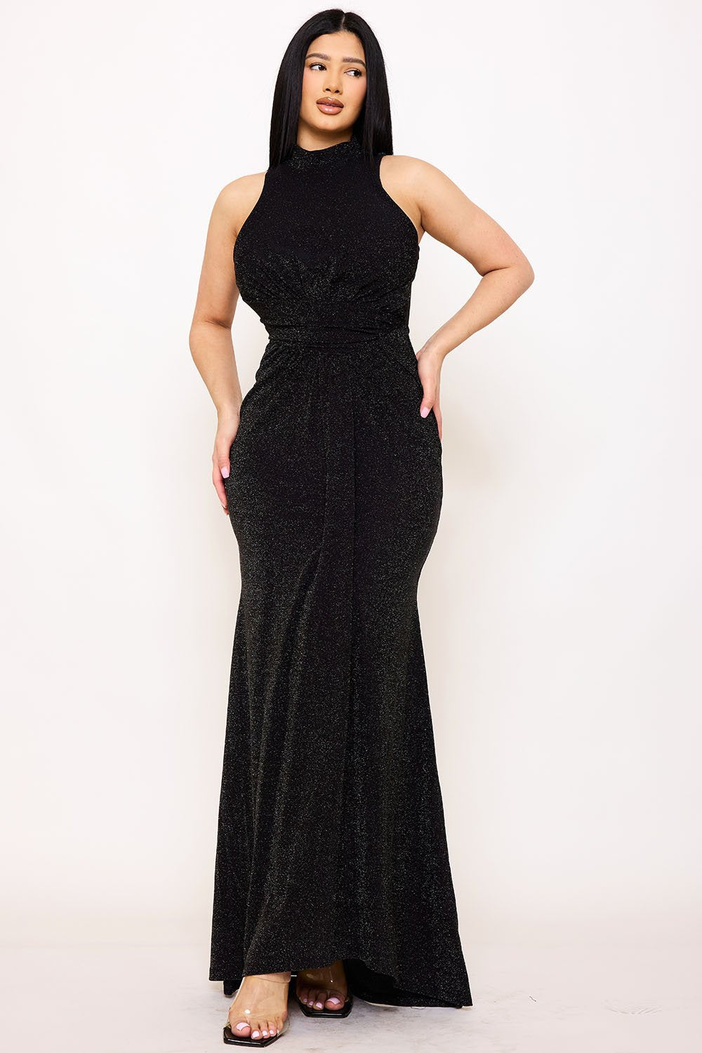 Black glitter sleeveless high-neck maxi dress with a fitted silhouette for formal occasions by Boutinie.