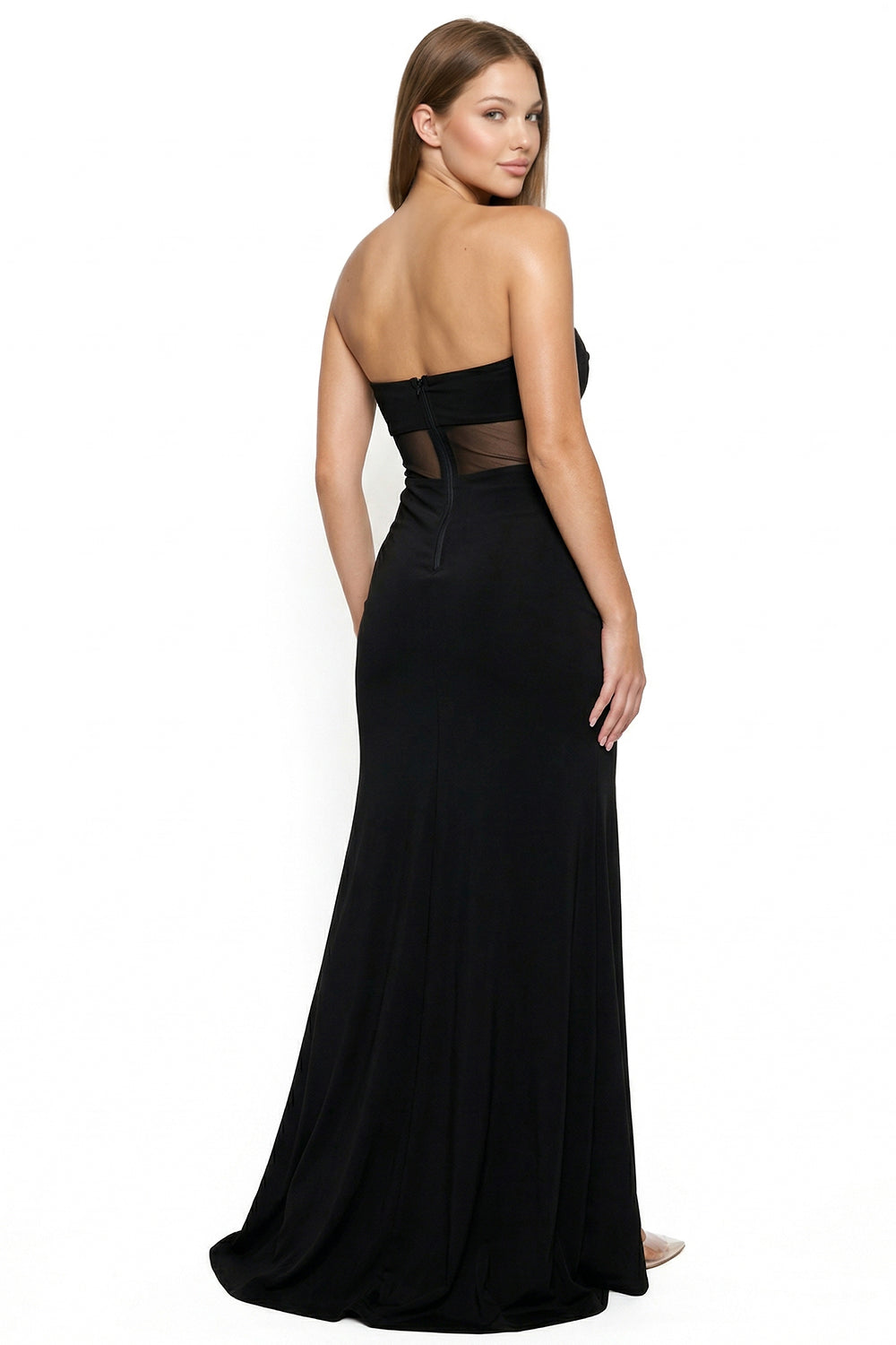 Black strapless evening gown with sheer mesh waist detail and floor-length silhouette from Boutinie.