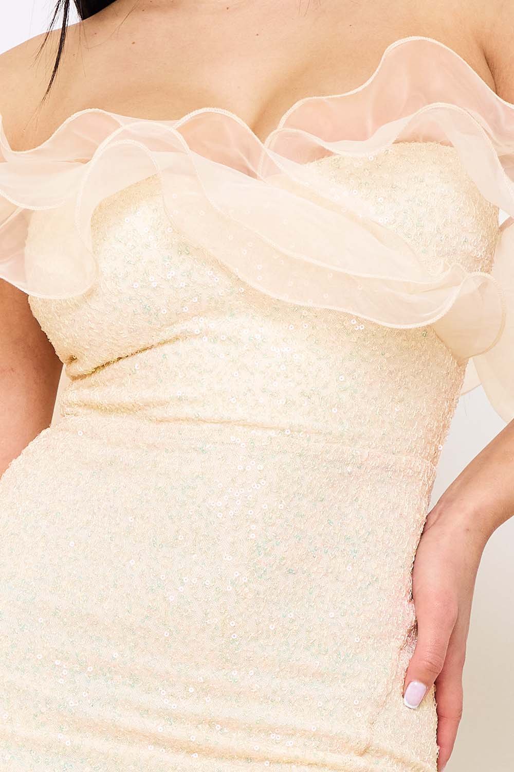 Champagne sequin mini dress with an off-the-shoulder ruffle neckline, perfect for a glamorous cocktail party.