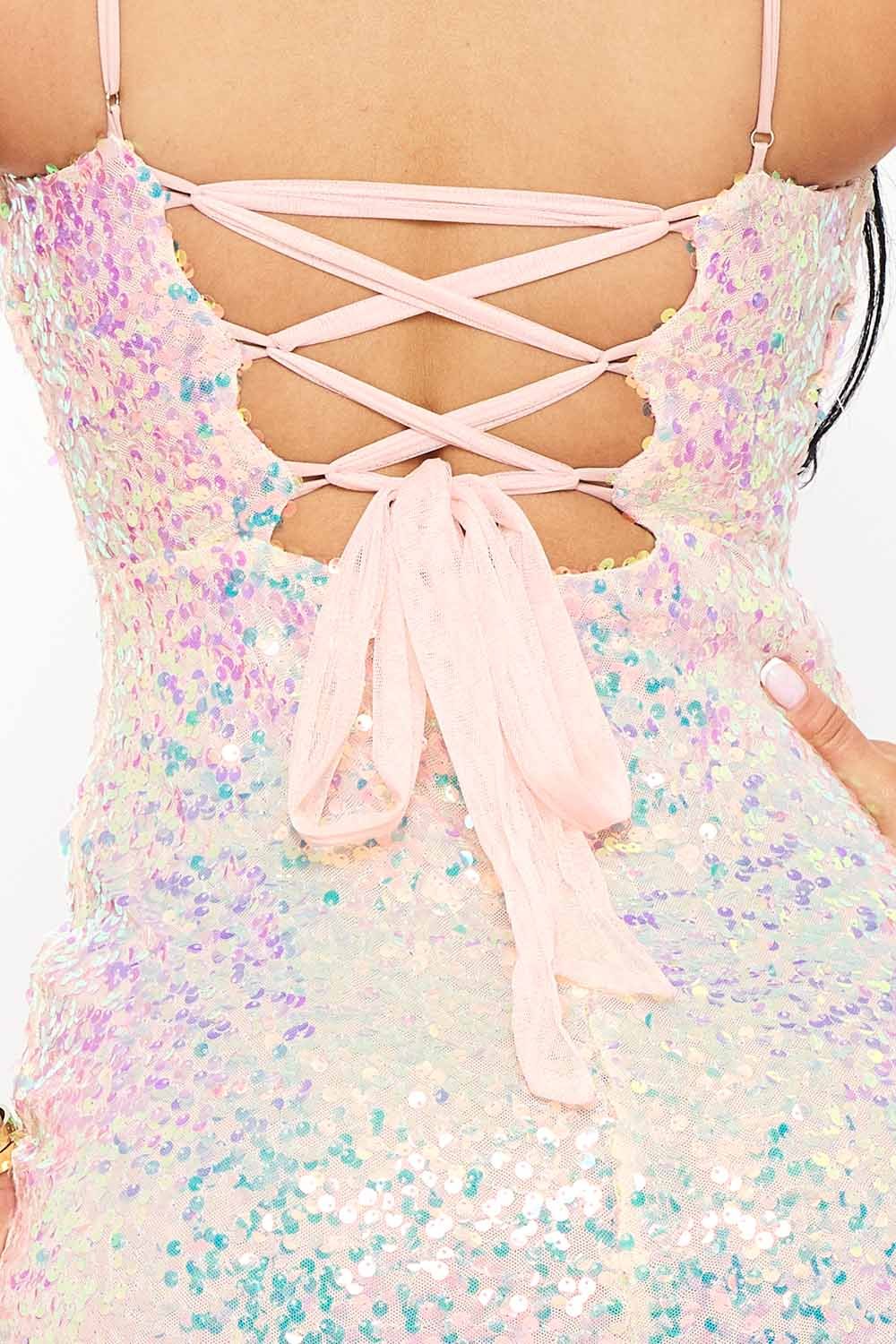 Iridescent pink sequin mini party dress with camisole straps and a lace-up tie back detail from Boutinie.