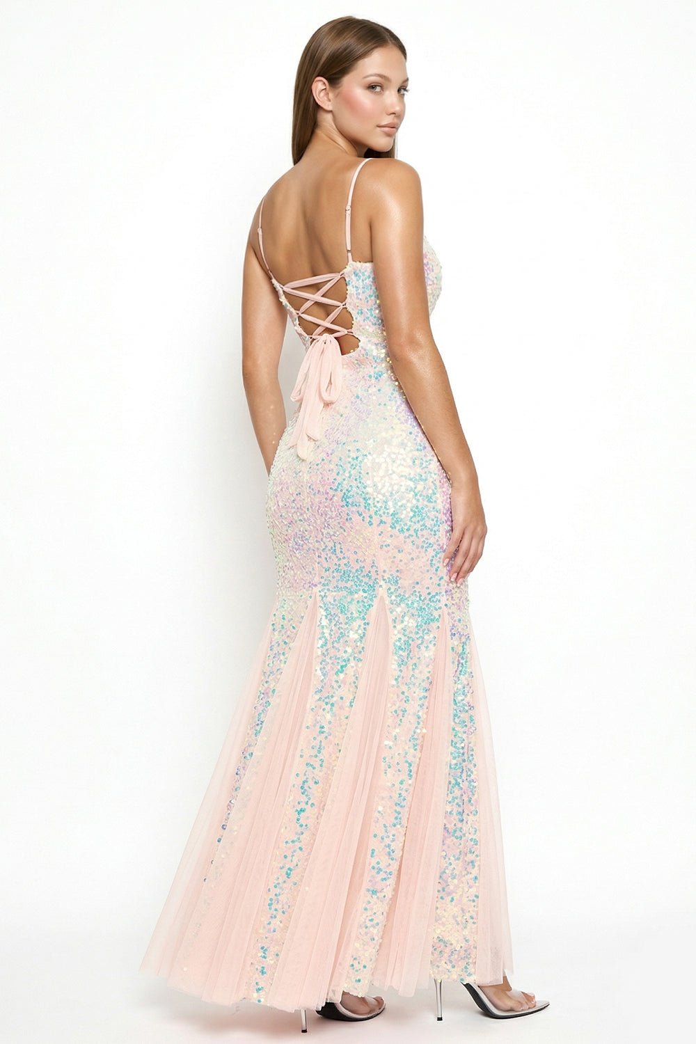 Iridescent sequin mermaid gown with lace-up back, thin straps, and tulle skirt for formal events by Boutinie.