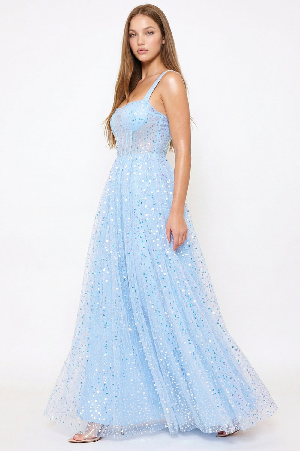 Boutinie light blue sequin corset prom gown with a square neckline, sleeveless bodice, and flowing floor-length skirt.