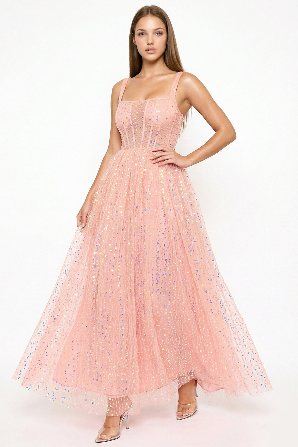 Pink sequin tulle ball gown with a square neckline, corset bodice, and full skirt for formal occasions by Boutinie.