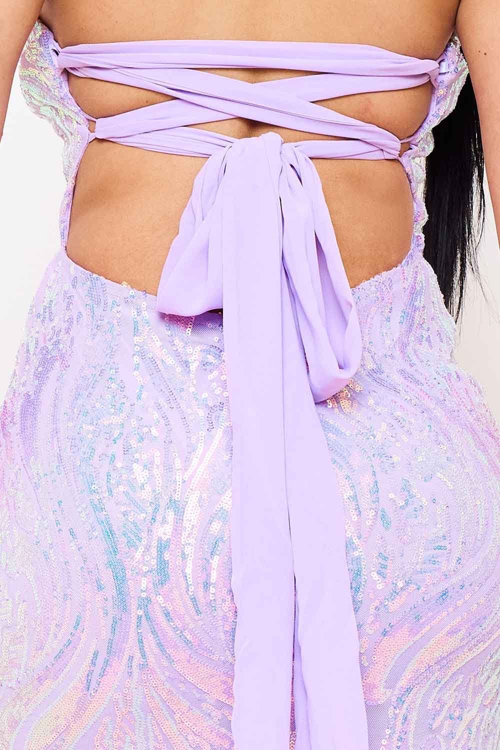 Lavender sequin party dress with an open tie-back design and lace-up detail for a glamorous formal look.