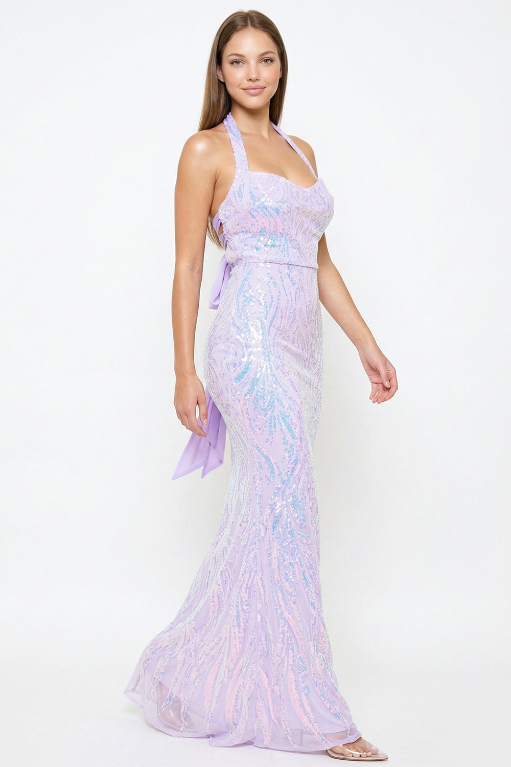 Lavender sequin mermaid evening gown with a halter neckline and tie-back detail for a glamorous formal look.