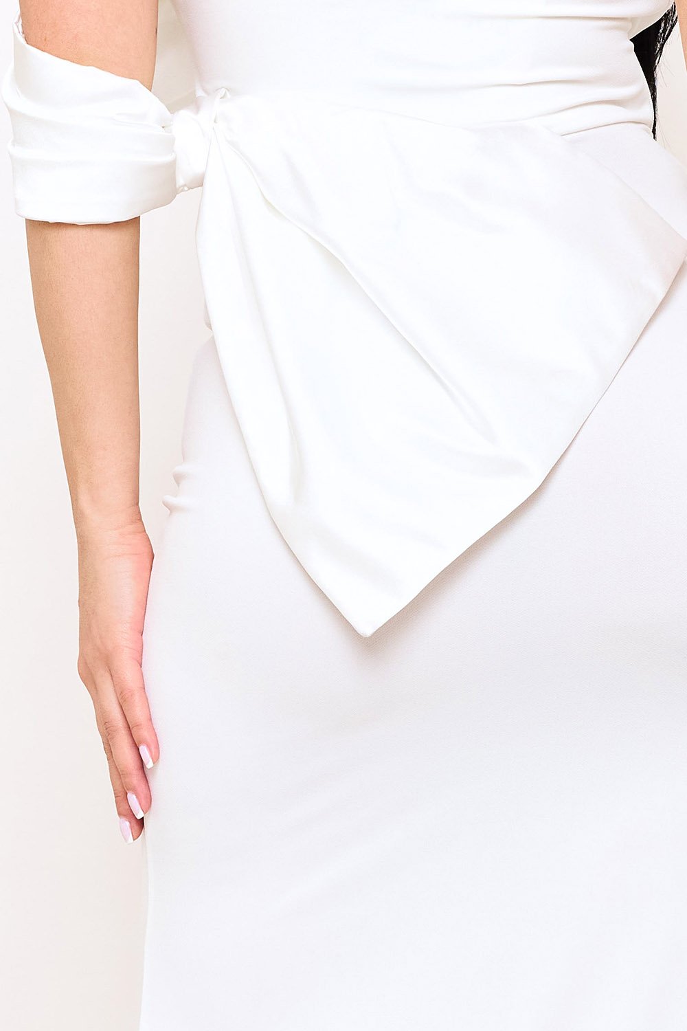 Elegant white midi dress from Boutinie featuring a chic side-tie waist detail and off-shoulder sleeves.