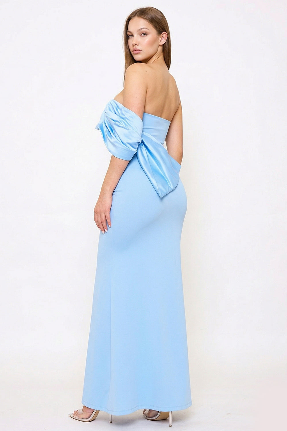 Light blue strapless evening gown with off-the-shoulder puff sleeve detail and fitted silhouette from Boutinie.