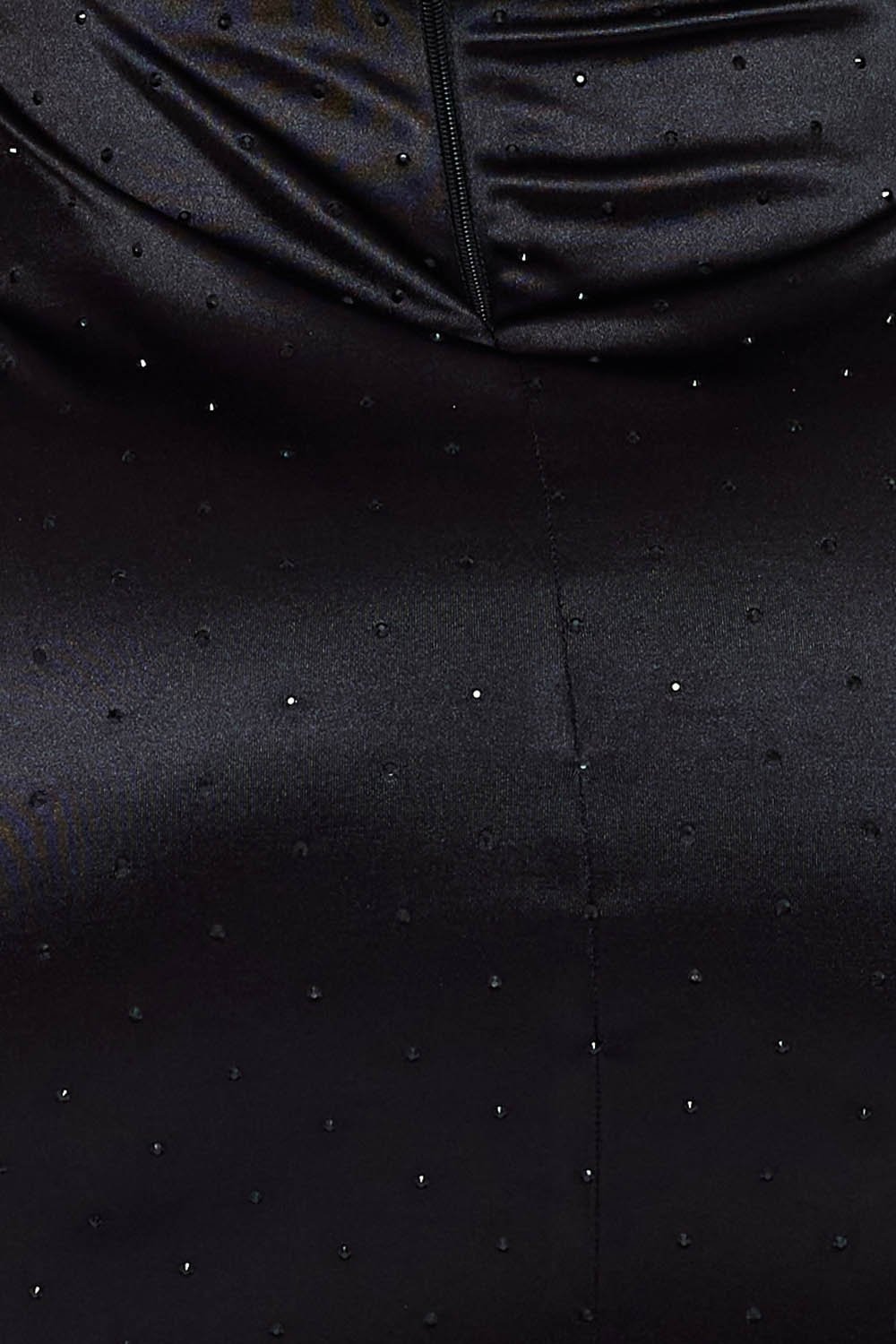 Close-up of a black satin evening dress with scattered rhinestone embellishments and elegant cowl neckline by Boutinie.