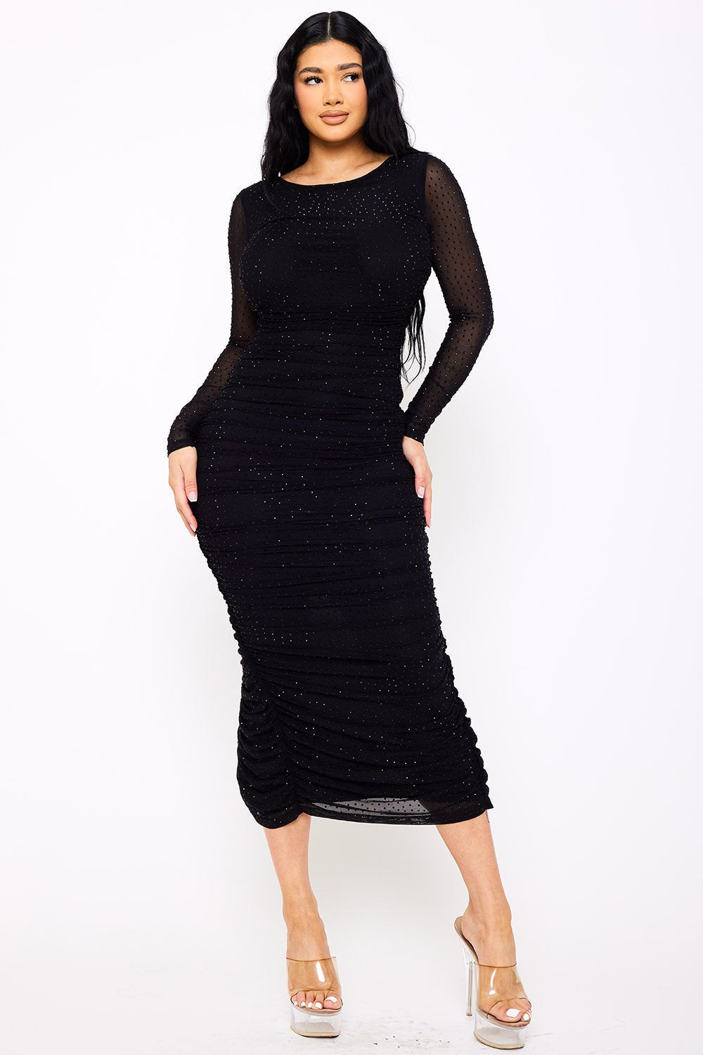 Black long-sleeve ruched midi dress in sparkly mesh fabric for a chic evening look from Boutinie.