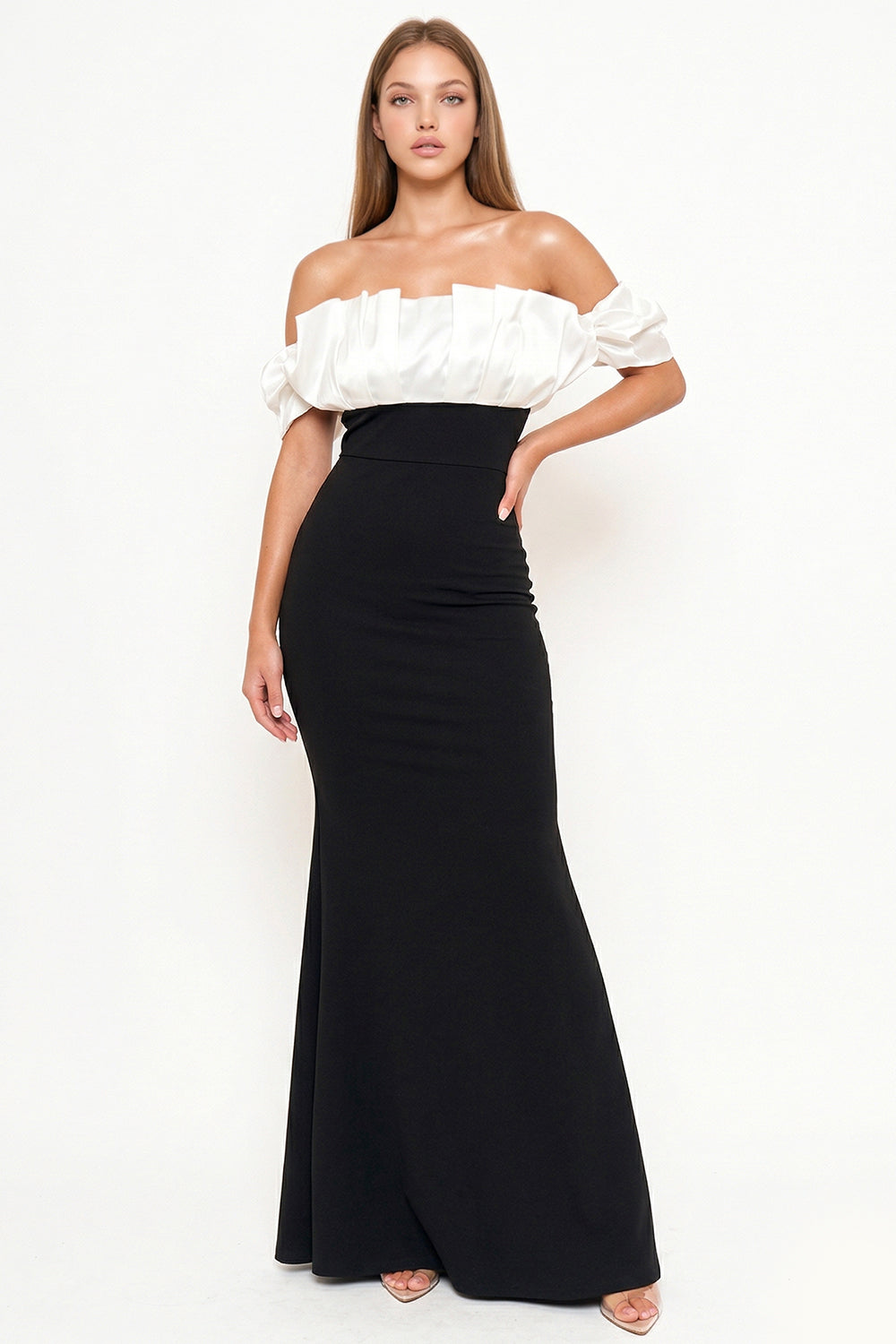 Elegant black and white off-the-shoulder formal gown with a pleated satin bodice and fitted floor-length skirt.
