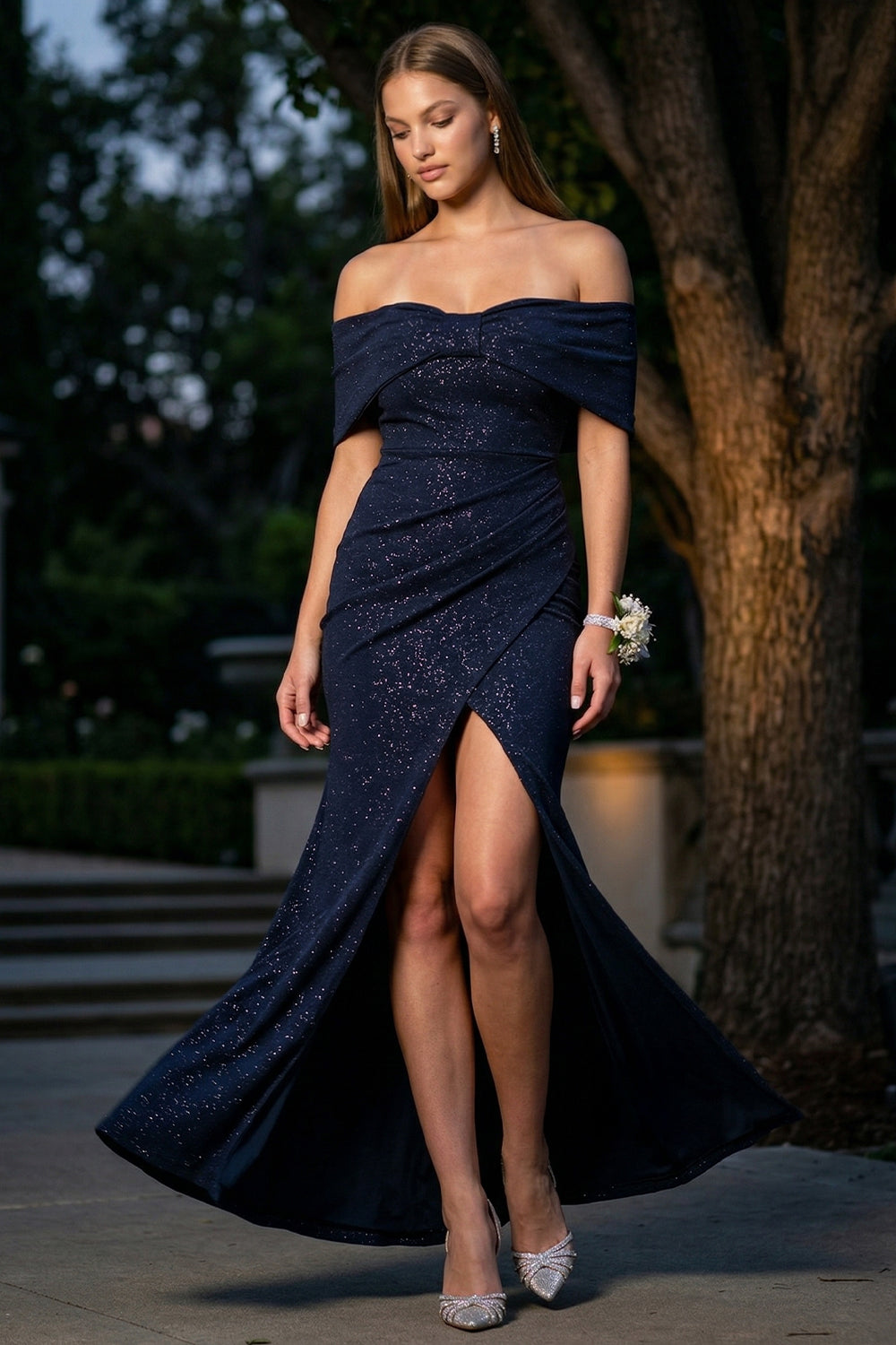 Navy blue off-shoulder glitter prom dress with a side-slit, perfect for formal events at Boutinie.