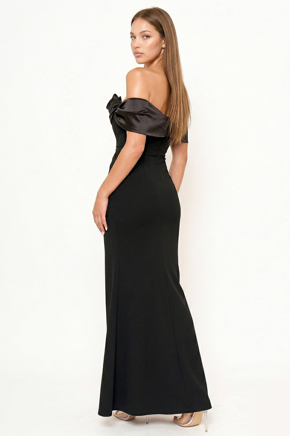 Black off-the-shoulder formal maxi gown with satin detail at the neckline, perfect for evening wear.