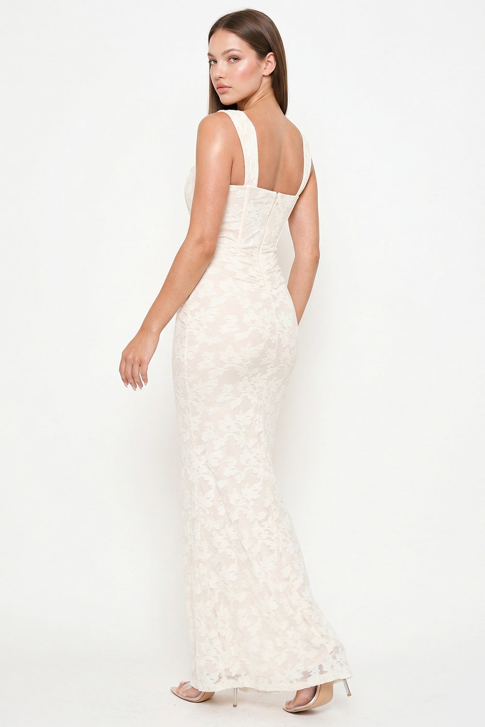 Cream lace maxi dress with corset-style bodice and square neckline, perfect for formal evening events by Boutinie.