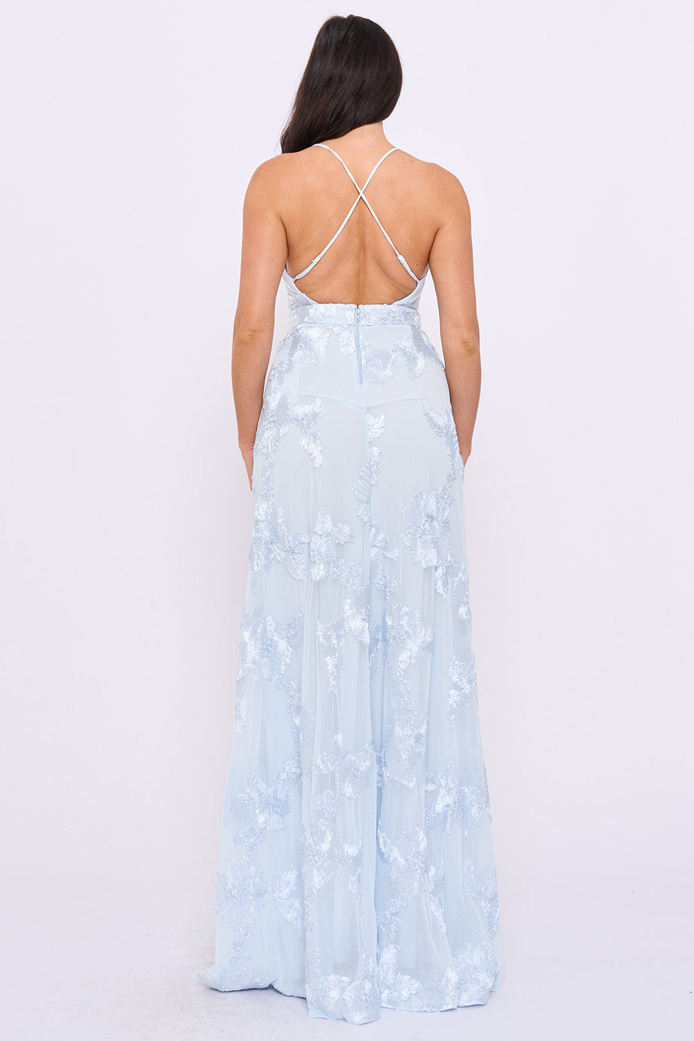 Light blue lace maxi formal gown with a crisscross back, featuring a sleeveless, elegant silhouette by Boutinie.