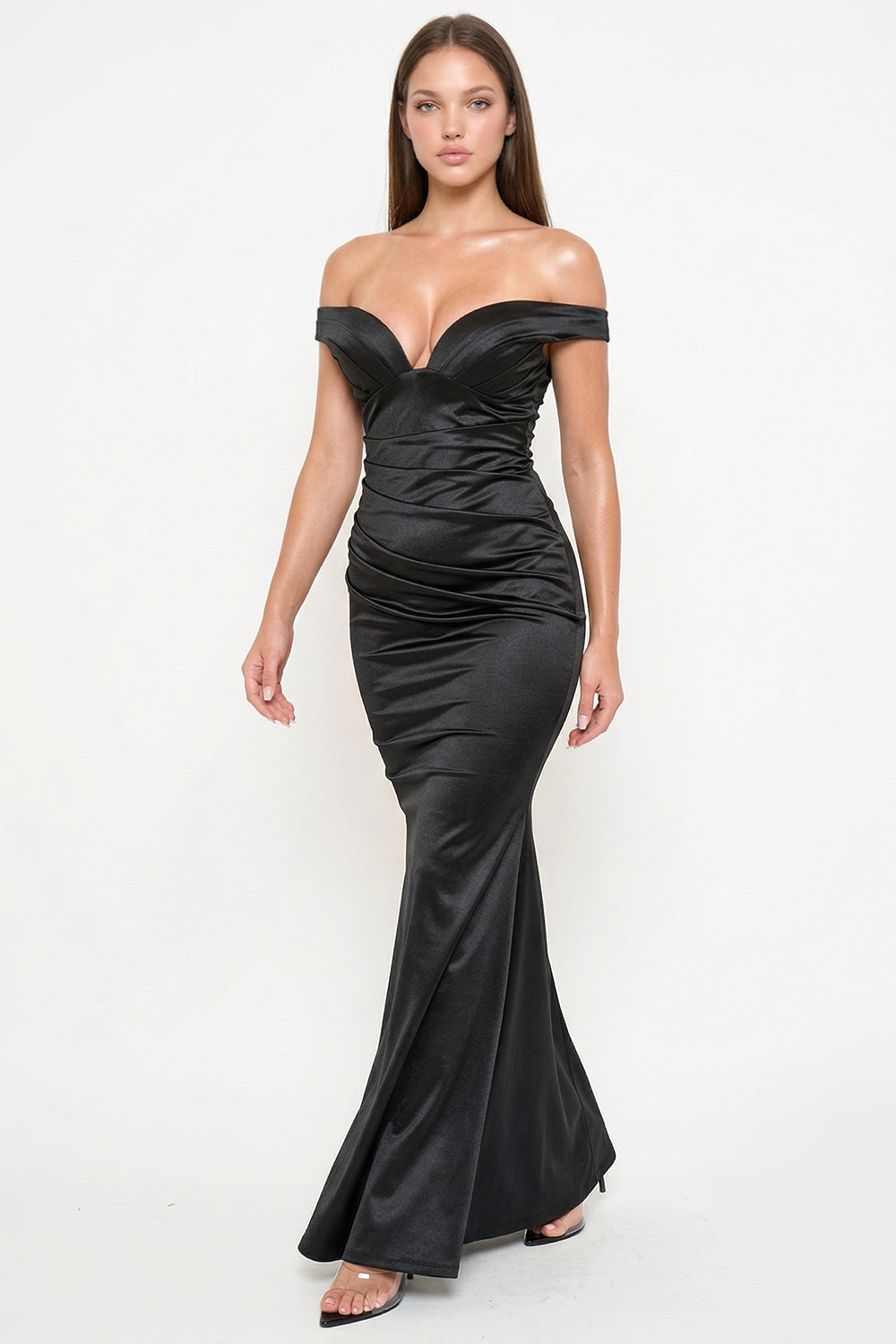 Black satin off-the-shoulder evening gown with ruched bodice and floor-length mermaid silhouette from Boutinie.