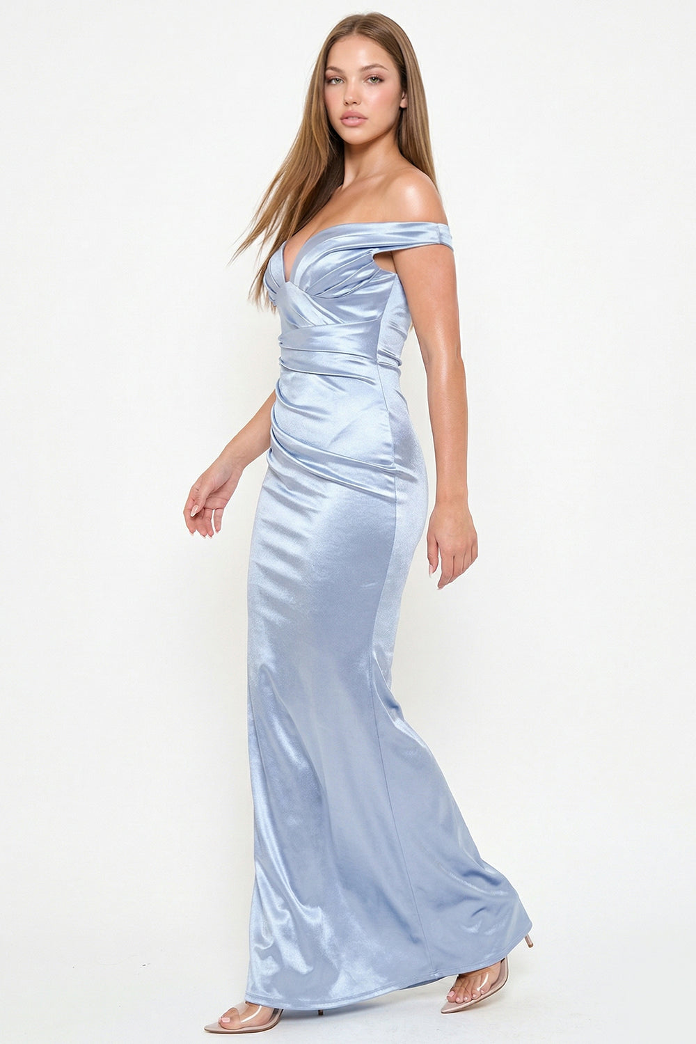 Light blue satin off-the-shoulder evening gown with a ruched bodice for a formal occasion at Boutinie.