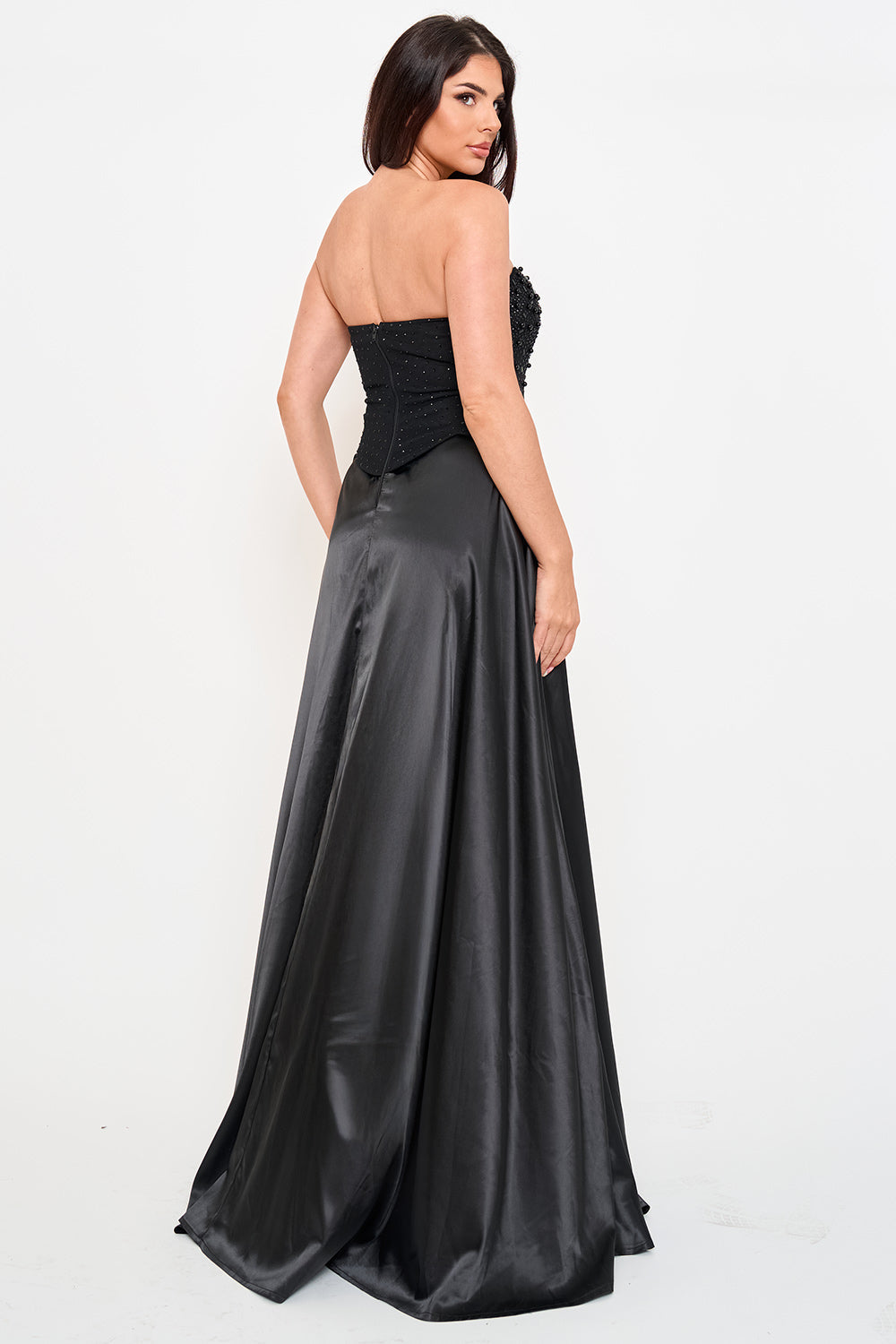 Boutinie black strapless corset evening gown with a beaded bodice and flowing satin skirt.