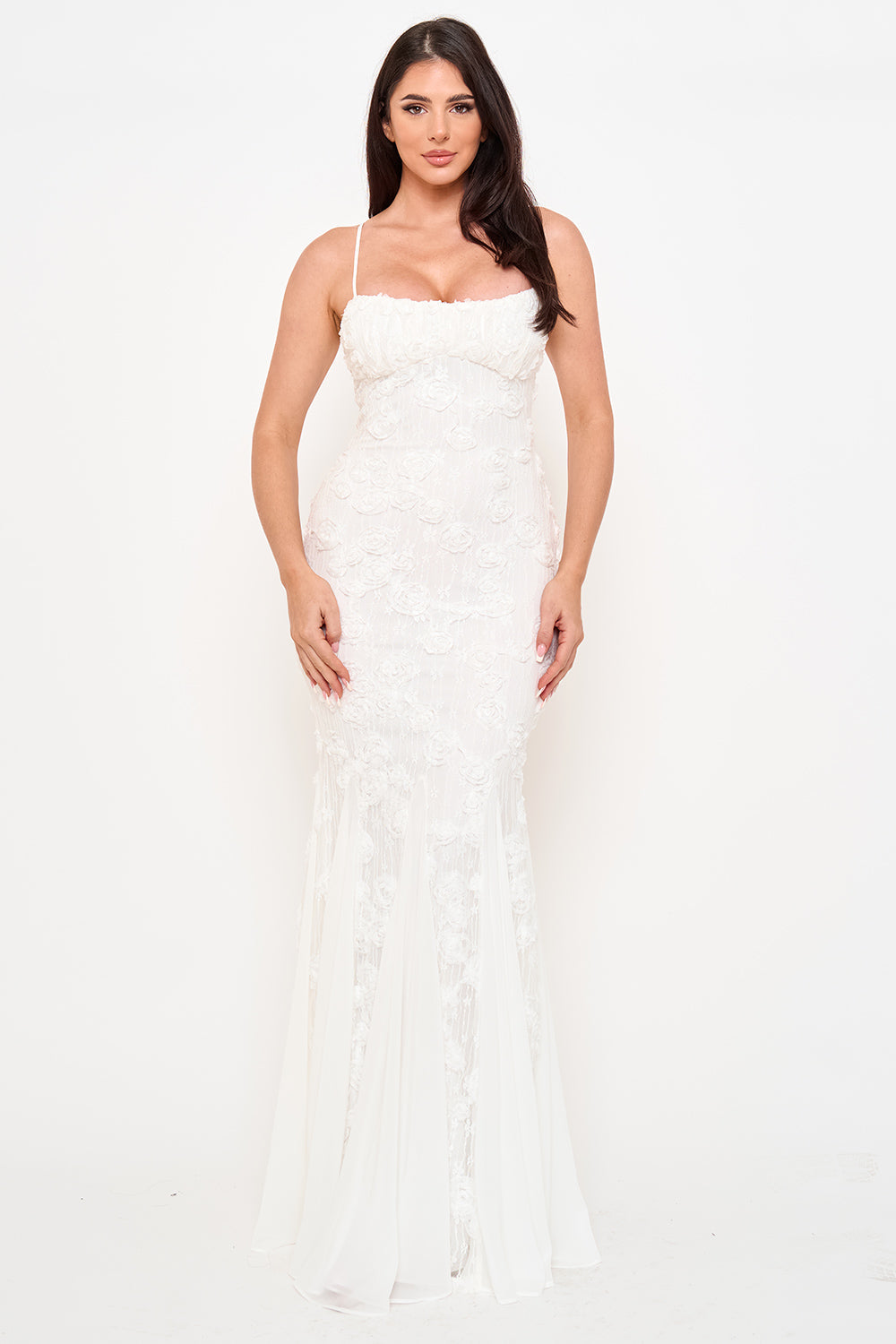 White lace mermaid gown with a square neckline and thin straps for an elegant formal evening look from Boutinie.