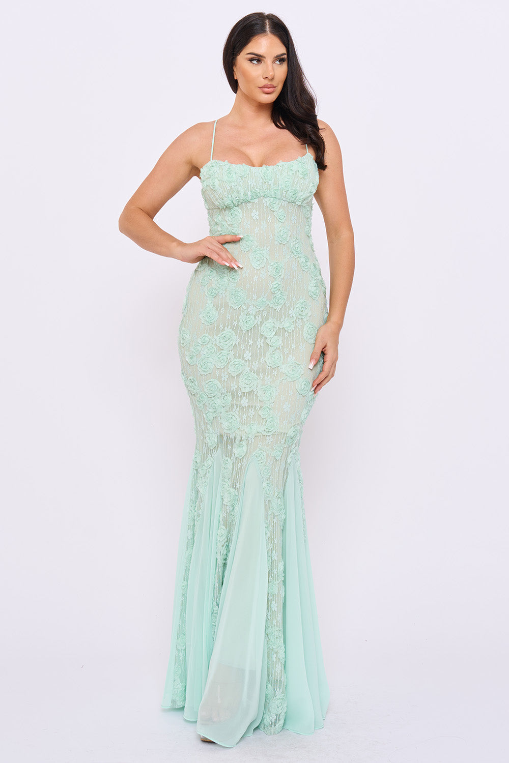 Mint green floral lace mermaid evening gown with spaghetti straps and a flattering fitted silhouette from Boutinie.