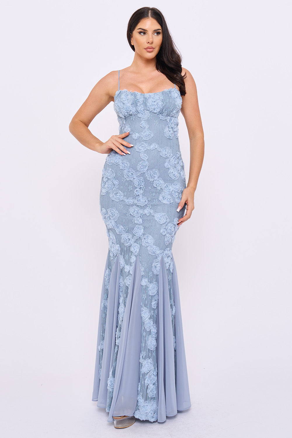 Dusty blue floral applique mermaid formal gown with spaghetti straps and a sweetheart neckline by Boutinie.