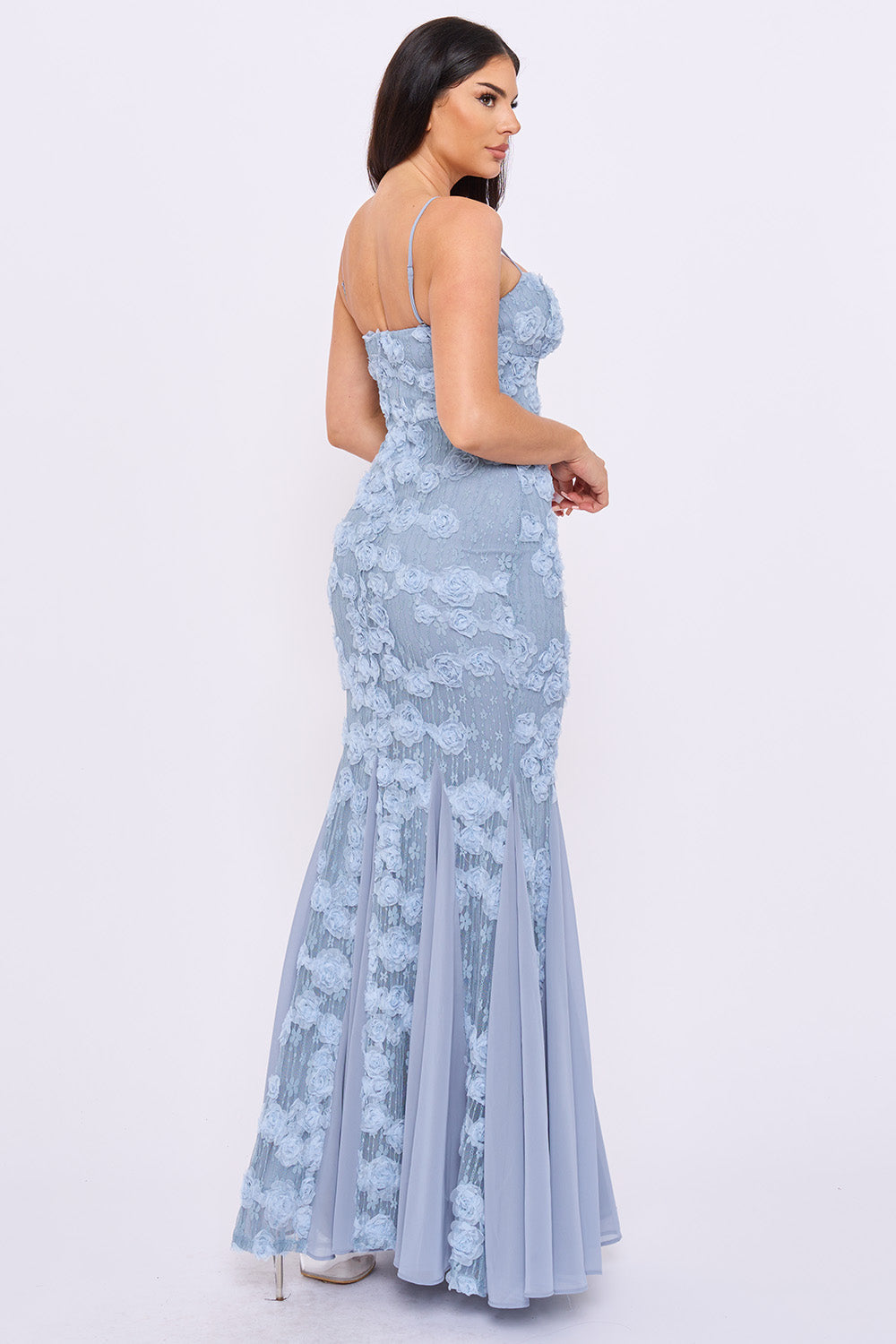 Dusty blue mermaid gown with 3D floral lace appliqué, spaghetti straps, and a flared hem for formal occasions.