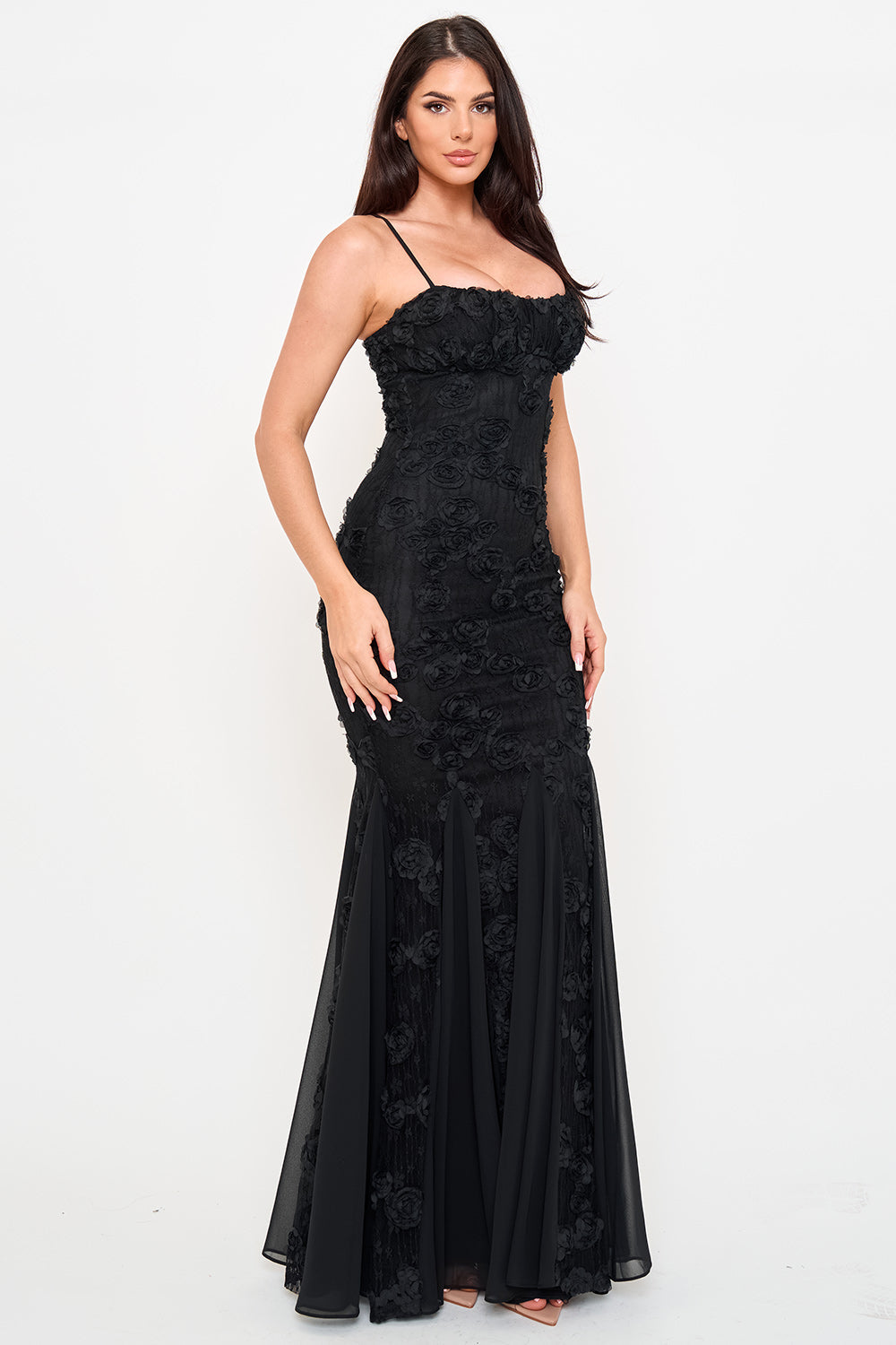 Black sleeveless mermaid gown with 3D floral lace appliqué and spaghetti straps, perfect for formal evening events.
