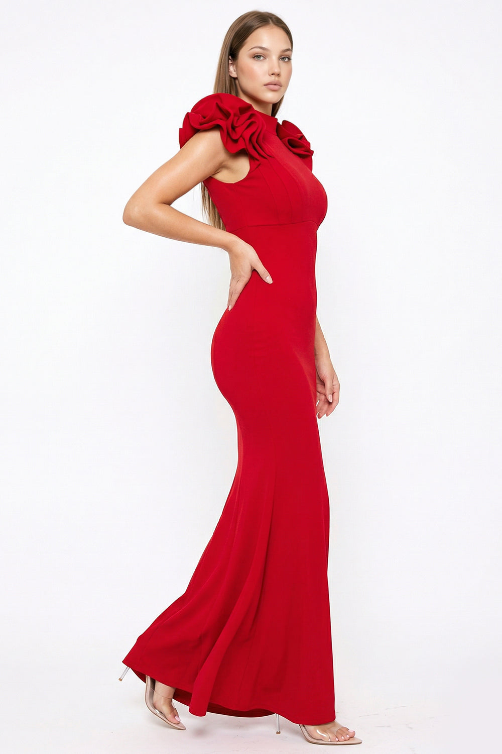 Boutinie red sleeveless evening gown with ruffled shoulders and a fitted floor-length silhouette.