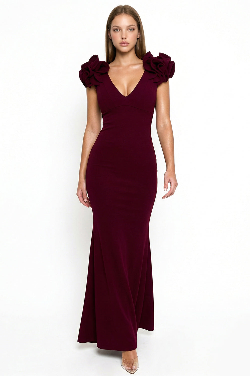 Boutinie burgundy maxi evening dress with V-neck, fitted silhouette, and sculptural ruffled shoulder details.