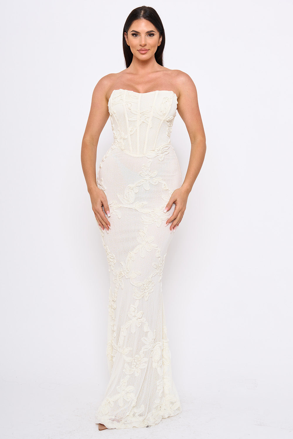 Cream strapless corset maxi dress with floral lace detailing, ideal for formal occasions at Boutinie.