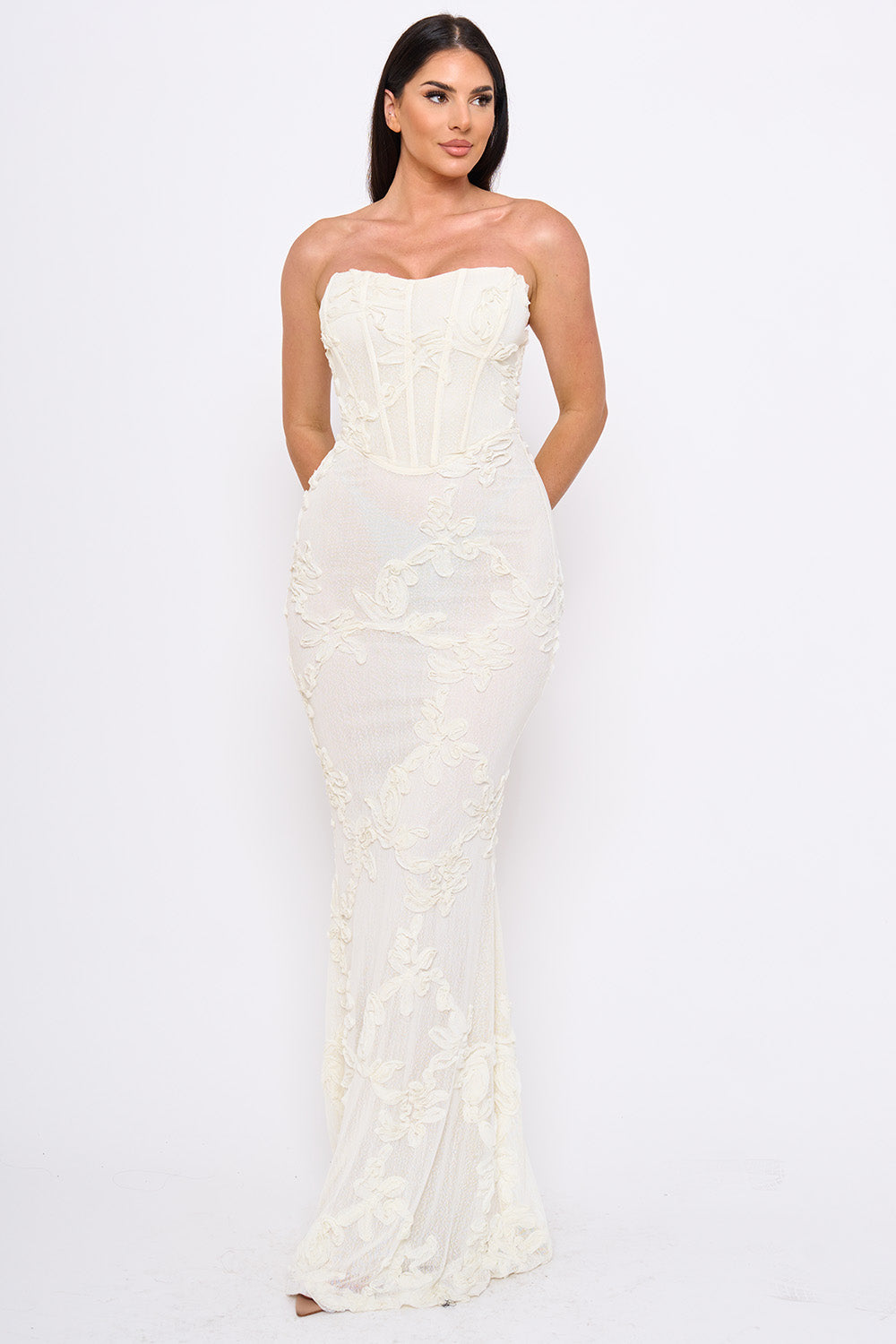 Cream strapless corset maxi dress with floral lace embroidery, perfect for formal events at Boutinie.
