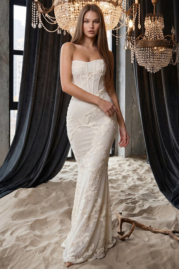 Boutinie white strapless corset gown with floral lace embroidery in a fitted mermaid silhouette for formal events.