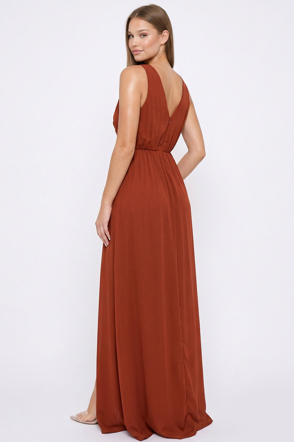 Rust orange sleeveless maxi dress with a V-neckline and flowy silhouette from Boutinie for formal occasions.