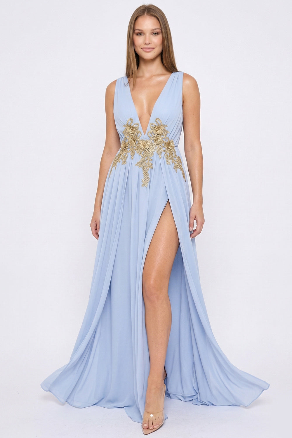 Light blue sleeveless evening gown with plunging neckline, gold floral embroidery, and a high leg slit by Boutinie.